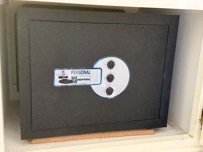 a black safe box that has a personal label on it