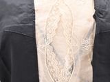 a close up of a dress on a mannequin mannequin