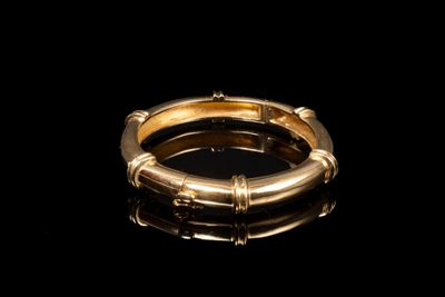 Bracelet jonc en or jaune 18K (750/1000) rehaussé de quatre godrons su - Photo 1