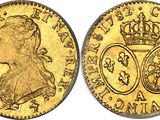 a gold sovereign coin with a crown on top of it