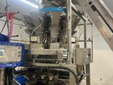 a picture of a machine that is working on a conveyor belt