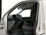 a white van with the door open and the driver ' s seat down
