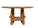 an image of a wooden table with a glass top on a white background