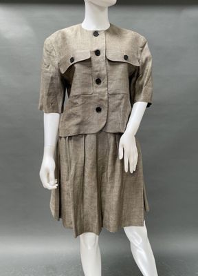 an image of a mannequin wearing a brown dress and jacket