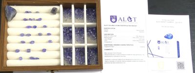 a box of blue and white candles sitting on top of a table