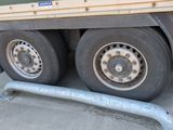 a truck that is parked on the side of the road