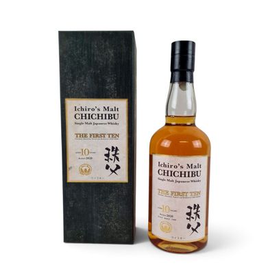 a bottle of chichibu single malt whisky next to a box