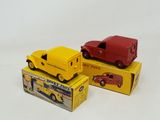 three toy cars that are sitting on top of each other