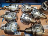a lot of different types of valves on a table