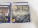 two video games are sitting on a table with a white table cloth
