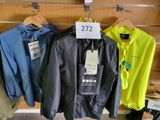 three jackets that are hanging on a rack in a store