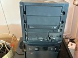 a black computer tower sitting on top of a black box
