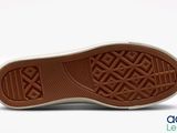 the sole of a pair of shoes is shown on a white background
