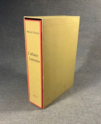 the book is open on a gray surface with a gray background