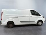 a picture of a white van parked in a garage