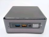 a small computer that is sitting on top of a table