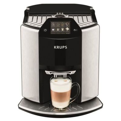 krups coffee machine with a cup of coffee in front of it