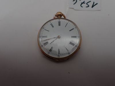 a gold pocket watch with roman numerals on it