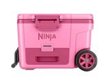 a pink cooler with wheels on a white background