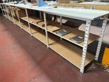 a long table with a bunch of shelves on it