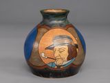a vase with a picture of a man smoking a pipe