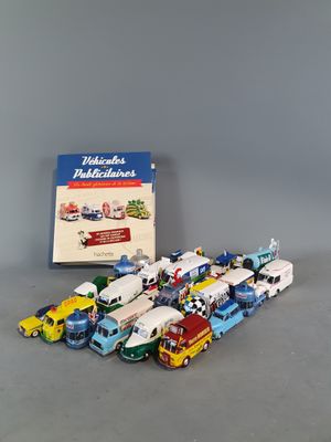 a lot of toy trucks that are sitting on a table