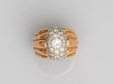 an 18k gold and diamond ring