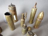 a lot of different types of brass items on a table