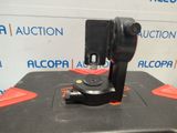 a close up of a camera mounted on top of a black box