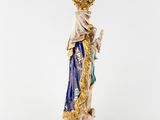 a statue of a woman with a crown on her head