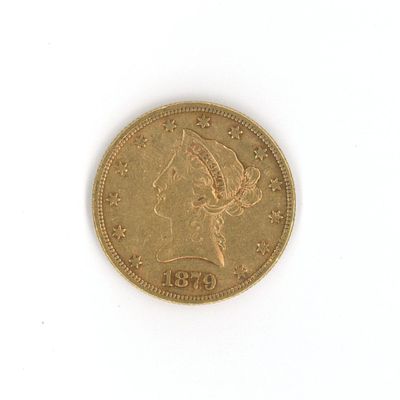 an image of a gold coin with a woman ' s head on it