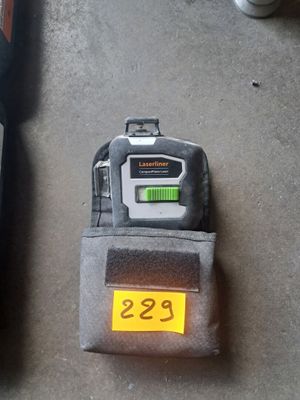 two cell phones that are sitting on the floor