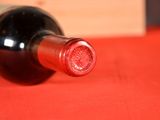 a bottle of wine that is sitting on a table