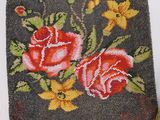 a picture of a purse with flowers and a pair of scissors