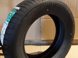 an image of a tire sitting on top of a cardboard box