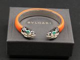 Bracelet rigide Bvlgari en émail orange et vert