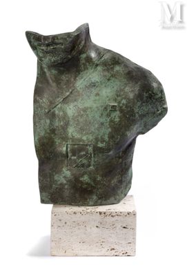 statue of a man ' s head on a marble base on a white surface