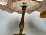 a lamp that is sitting on a table in a room