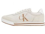 a white sneakers with a k logo on the side