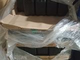 a box of empty bottles sitting on top of a carton