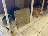 a picture of a room that has a bunch of items on the floor