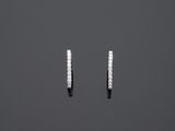 une paire de boucles d'oreilles en diamant