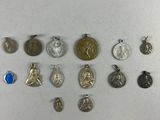 some of the medals are on display on a white surface
