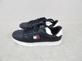 a close up of a pair of black and white sneakers