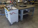 a machine that is sitting on a table in a factory