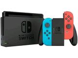 two nintendo switch controllers sitting next to each other in front of a box