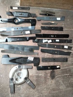 a lot of different types of blades on the table
