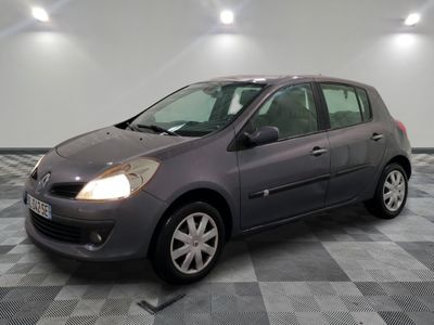 a picture of a grey car parked in a garage