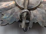 an image of a close up of a metal object on a table