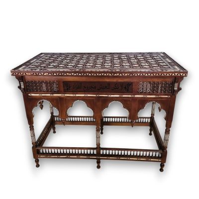 an image of a wooden table with a tile top on a white background